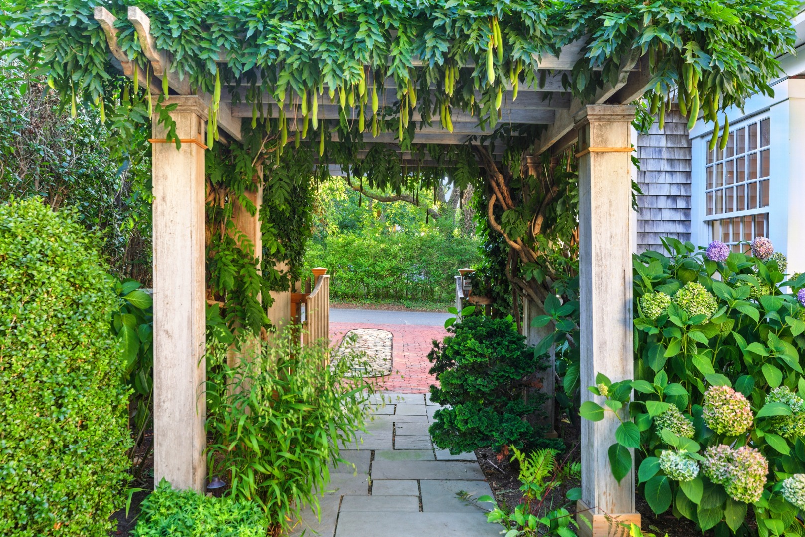 18 Mill Street Nantucket, MA 02554 - Photo 45 of 47 Arbor from Patio to driveway
