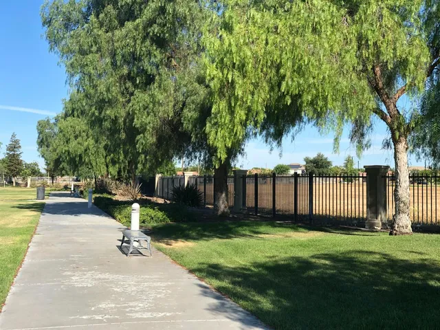 a house with trees in the background