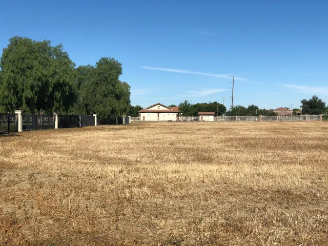 a view of an ocean and city