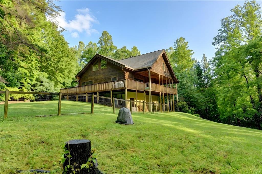 82 Walnut Grove Lane Tiger, GA 30576 - Photo 67 of 88 a view of a house with backyard and trees