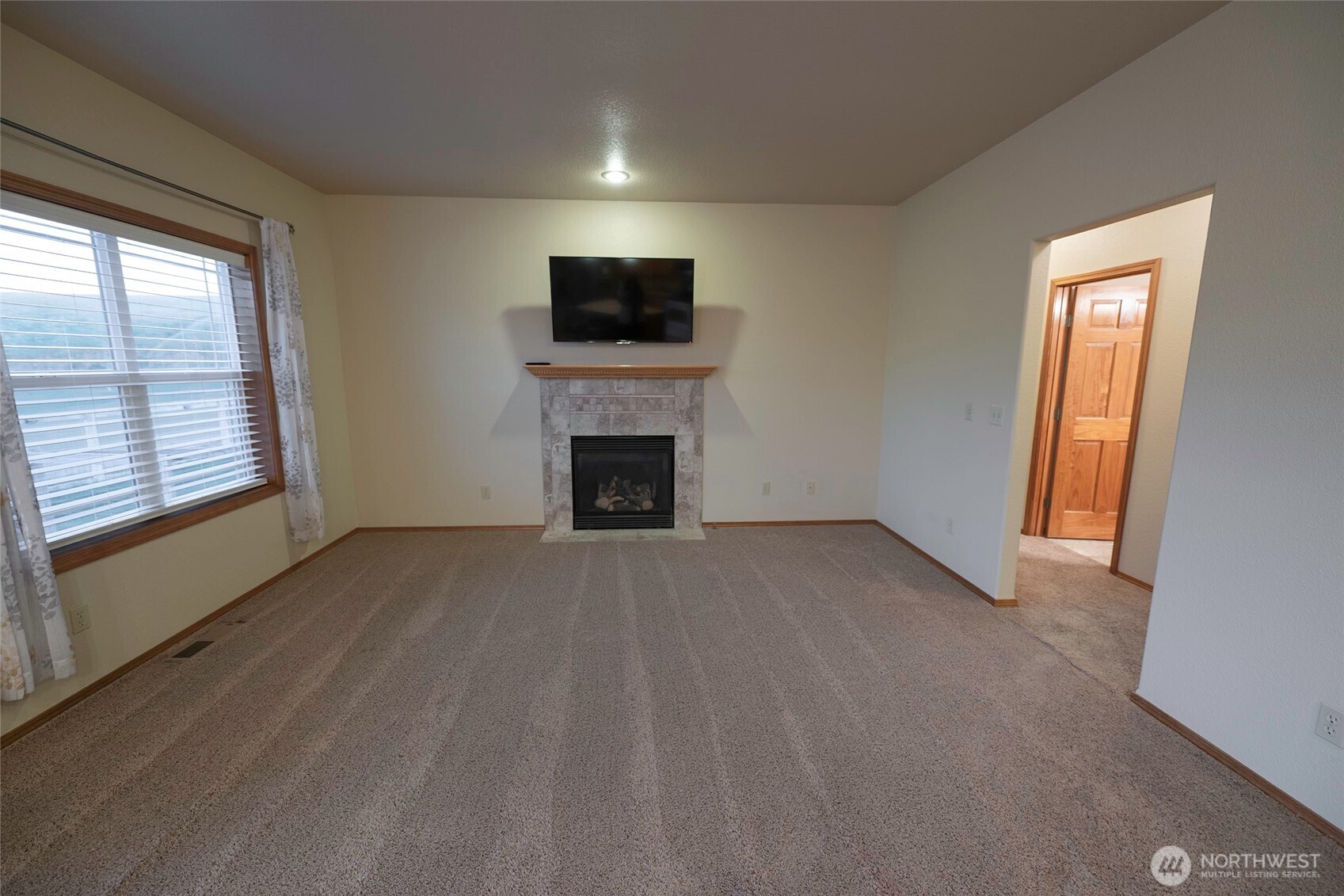 6279 Touchet North Road Touchet, WA 99360 - Photo 12 of 34 a view of empty room with a fireplace
