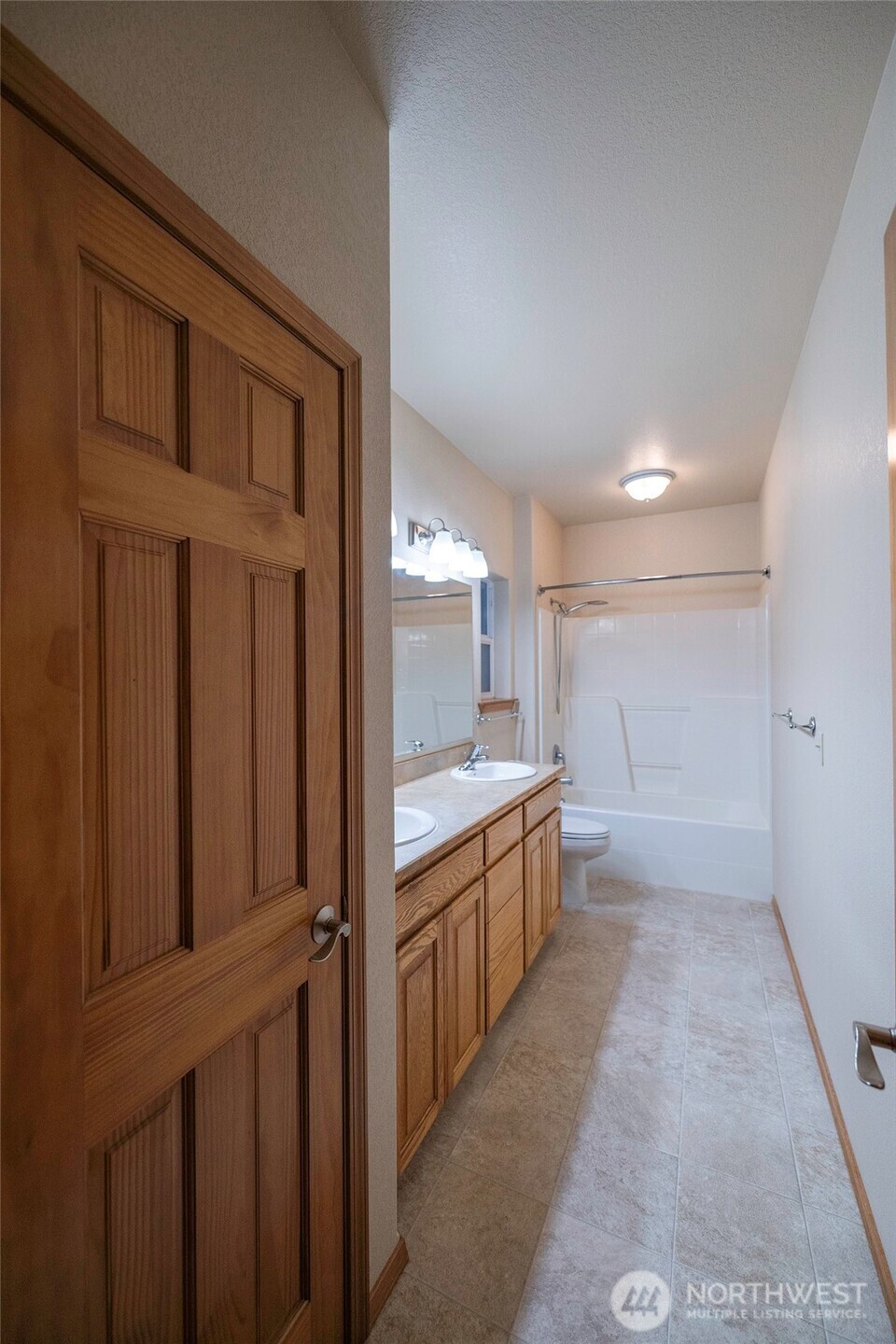 6279 Touchet North Road Touchet, WA 99360 - Photo 27 of 34 a kitchen with granite countertop a sink and cabinets