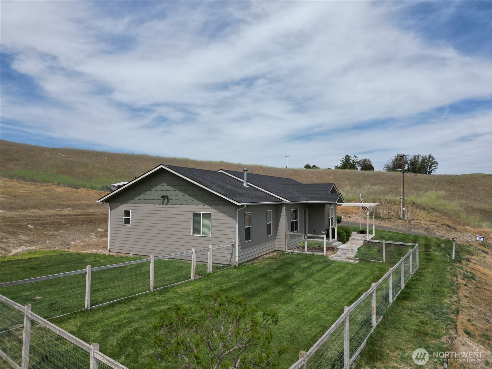6279 Touchet North Road Touchet, WA 99360 - Photo 33 of 34 a aerial view of a house with a big yard and potted plants