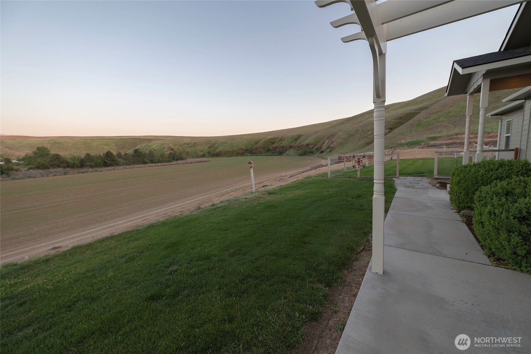 6279 Touchet North Road Touchet, WA 99360 - Photo 9 of 34 a view of a lake with a yard