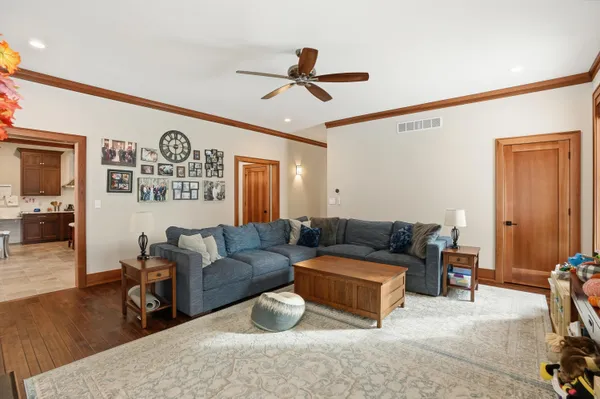 a spacious bedroom with a bed and a window