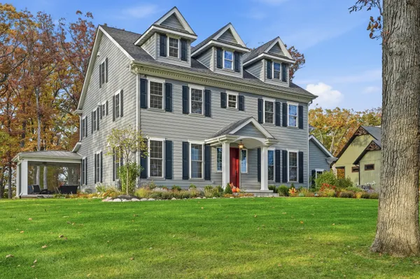 front view of a house with a yard