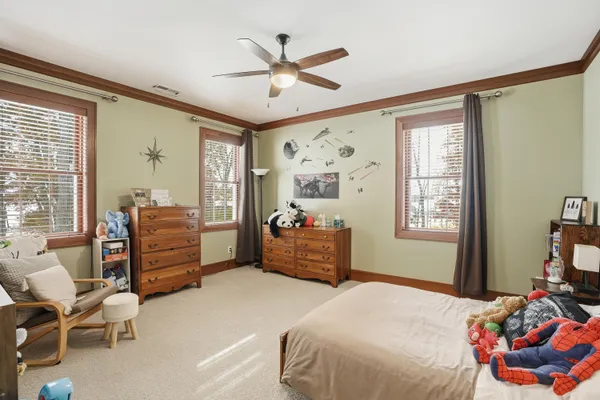 an aerial view of residential houses with outdoor space