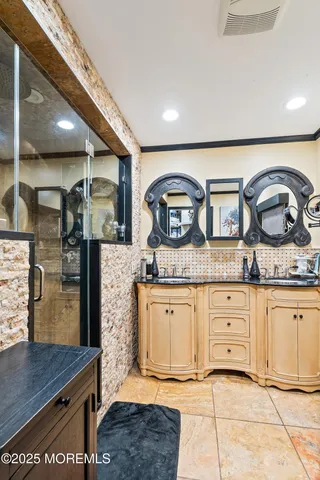 a living room with granite countertop furniture and a wooden floor