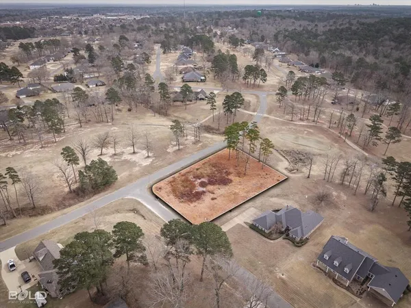 an aerial view of a house with a outdoor space