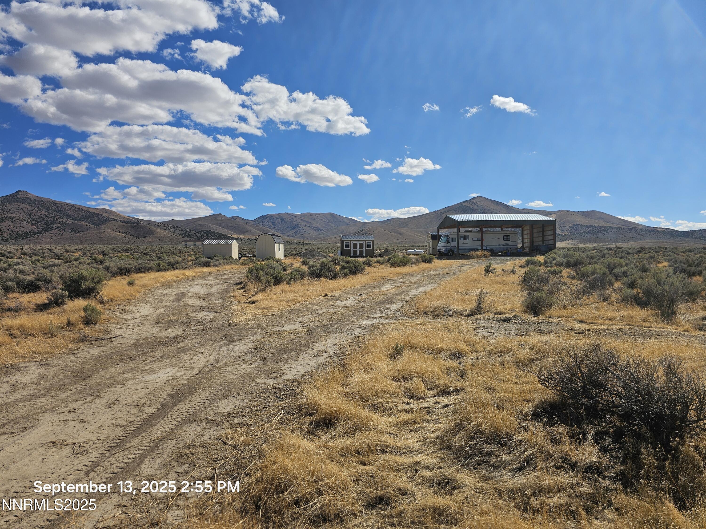 10355 Bobcat Road Winnemucca, NV 89445 - Photo 1 of 14 a view of a yard with an ocean
