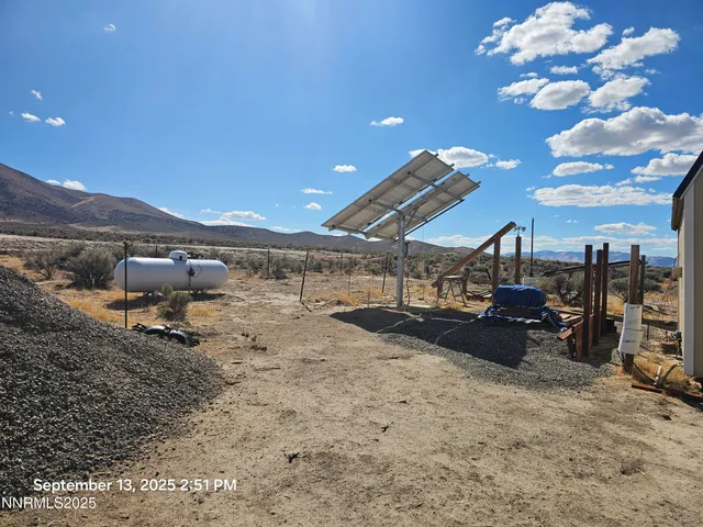 a view of a backyard of a house