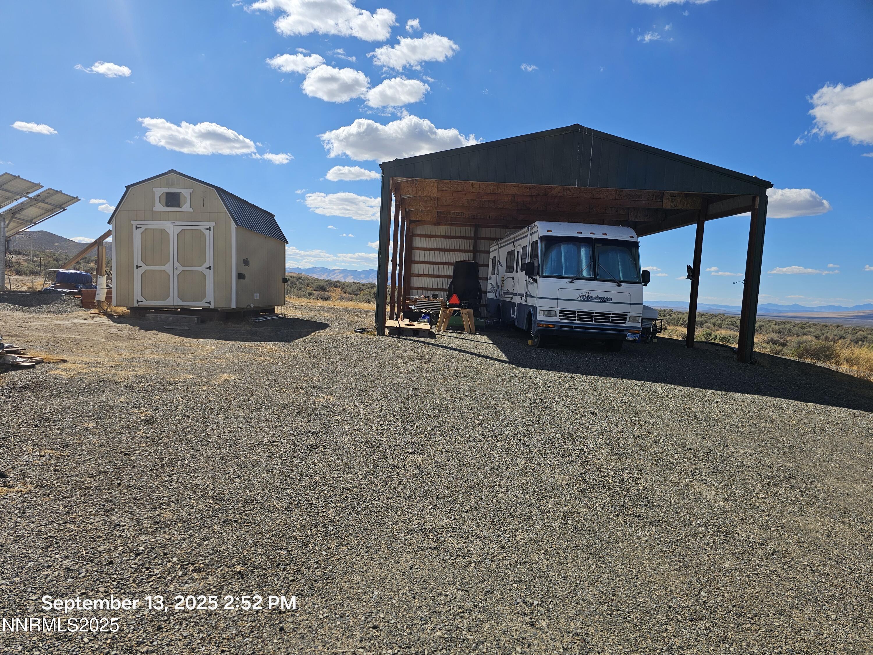 10355 Bobcat Road Winnemucca, NV 89445 - Photo 5 of 14 a view of a car in front of a house