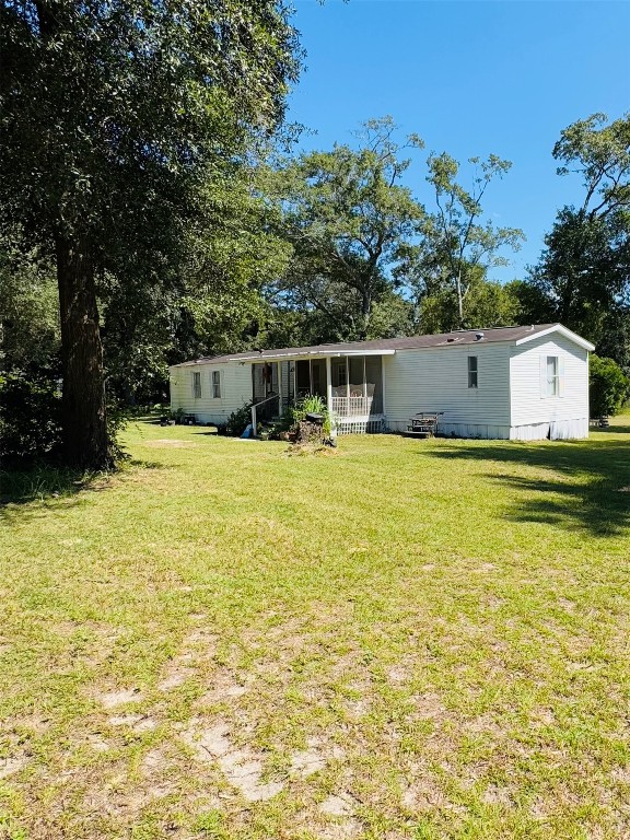 a view of a swimming pool with an outdoor seating
