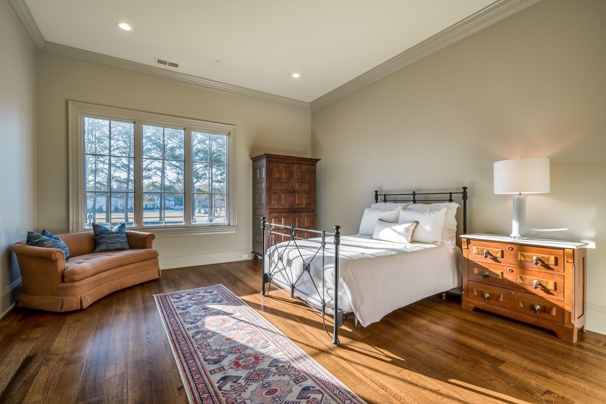 248 Dubray Manor Drive Collierville, TN 38017 - Photo 16 of 25 a bed room with bed and a window