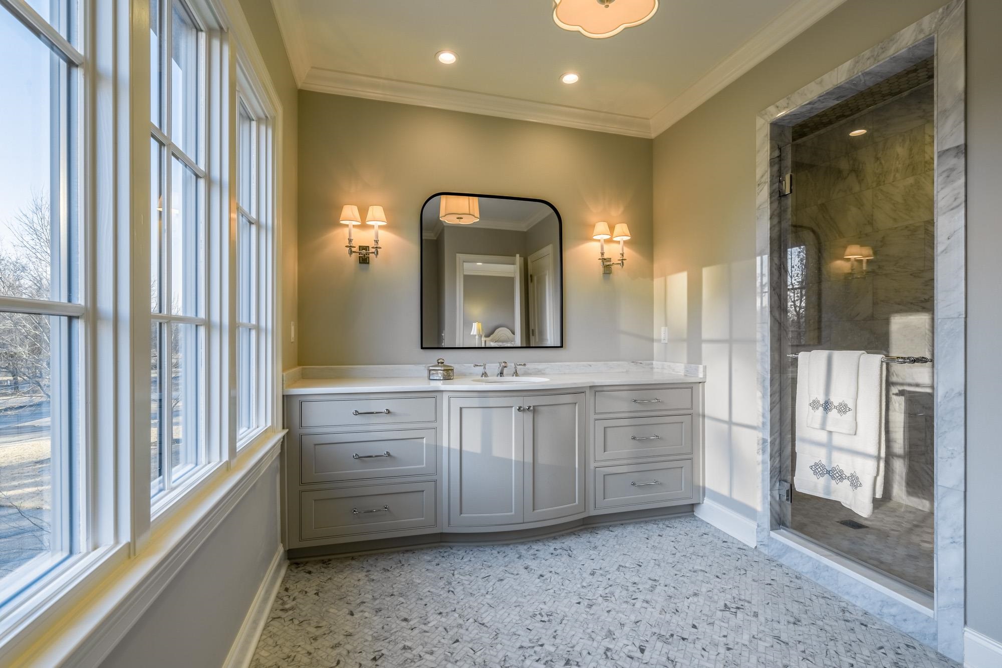 248 Dubray Manor Drive Collierville, TN 38017 - Photo 20 of 25 a bathroom with a double vanity sink and a mirror