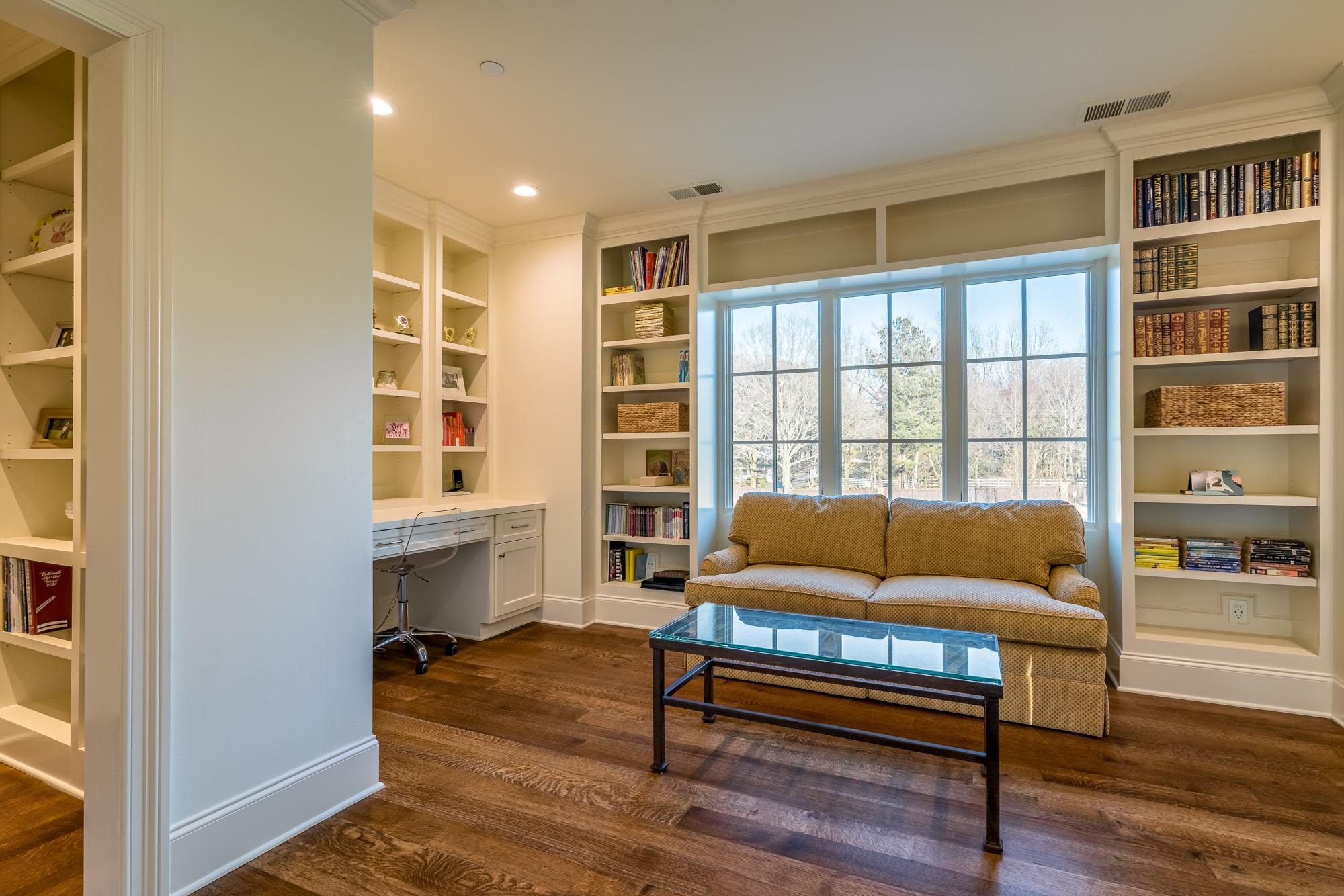 248 Dubray Manor Drive Collierville, TN 38017 - Photo 21 of 25 a living room with furniture and a window