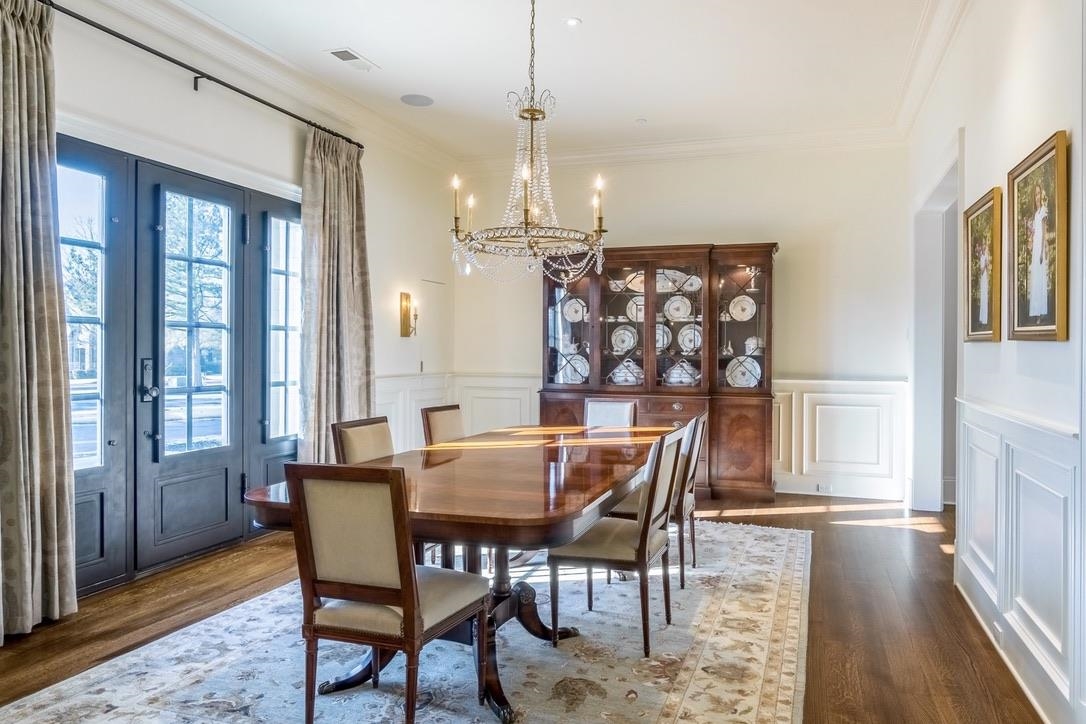 248 Dubray Manor Drive Collierville, TN 38017 - Photo 7 of 25 a view of a dining room with furniture window and wooden floor
