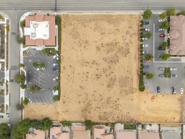 a bathroom with a shower curtain and a sink
