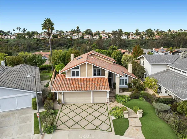 a house view with a garden space