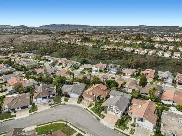 an aerial view of a city with lots of residential buildings