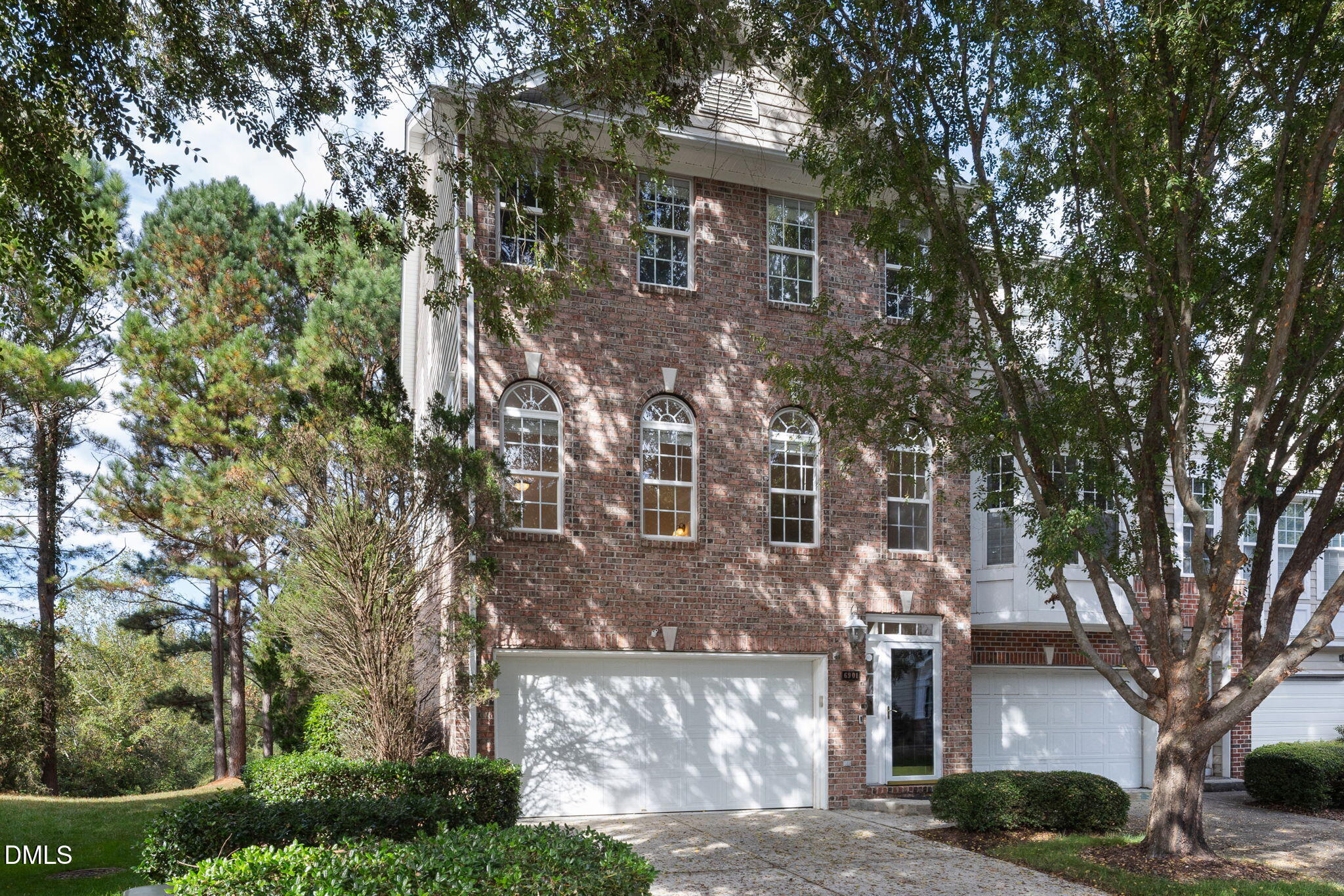 6901 Middleboro Drive Raleigh, NC 27612 - Photo 1 of 42 a front view of a house with a yard and large trees