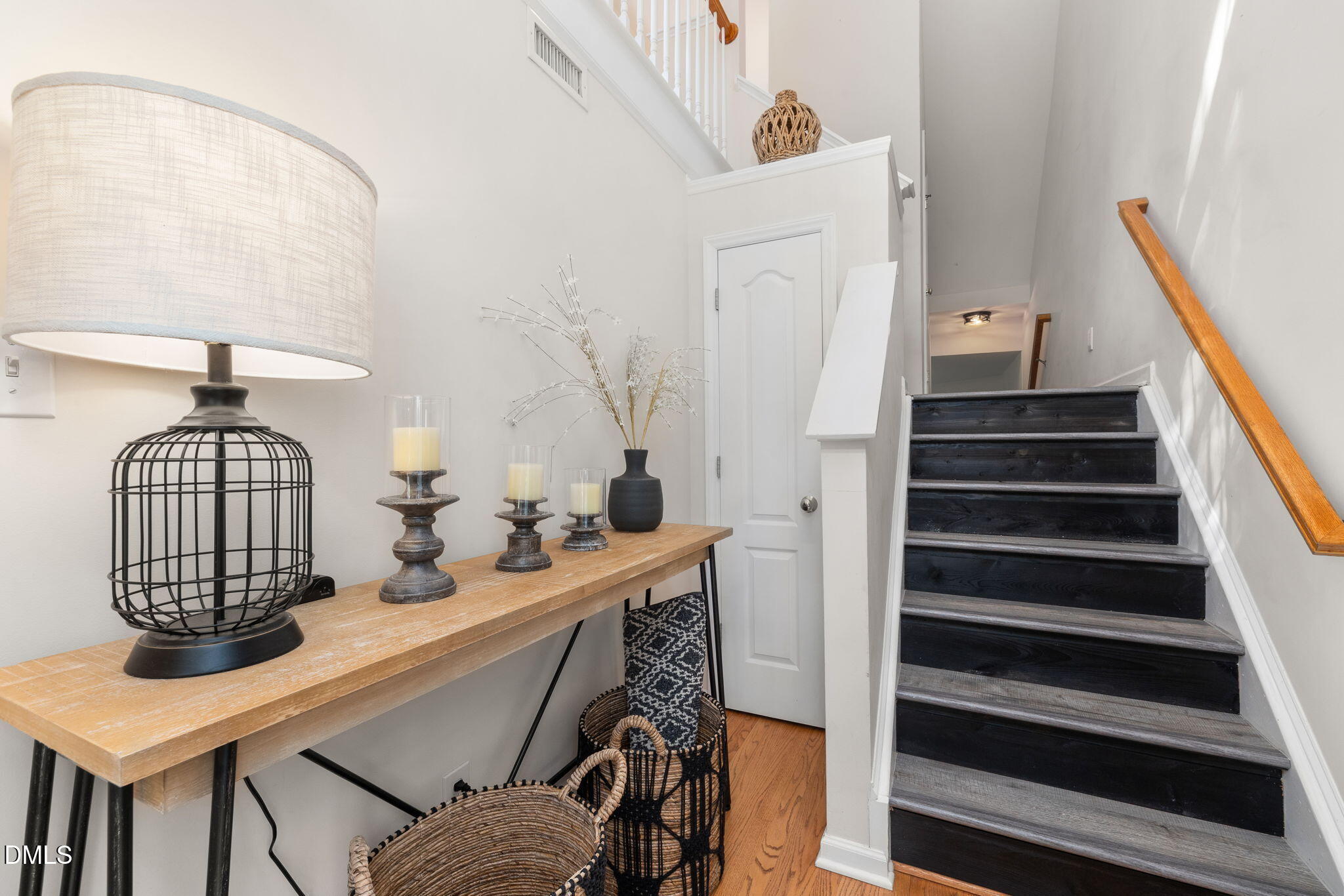 6901 Middleboro Drive Raleigh, NC 27612 - Photo 9 of 42 a view of entryway and hall with wooden floor