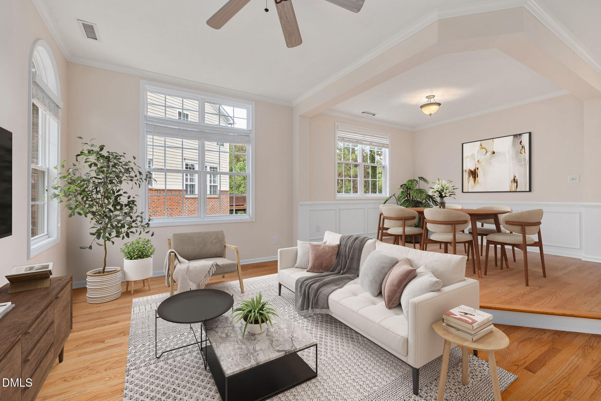 6901 Middleboro Drive Raleigh, NC 27612 - Photo 12 of 42 a living room with furniture and a potted plant