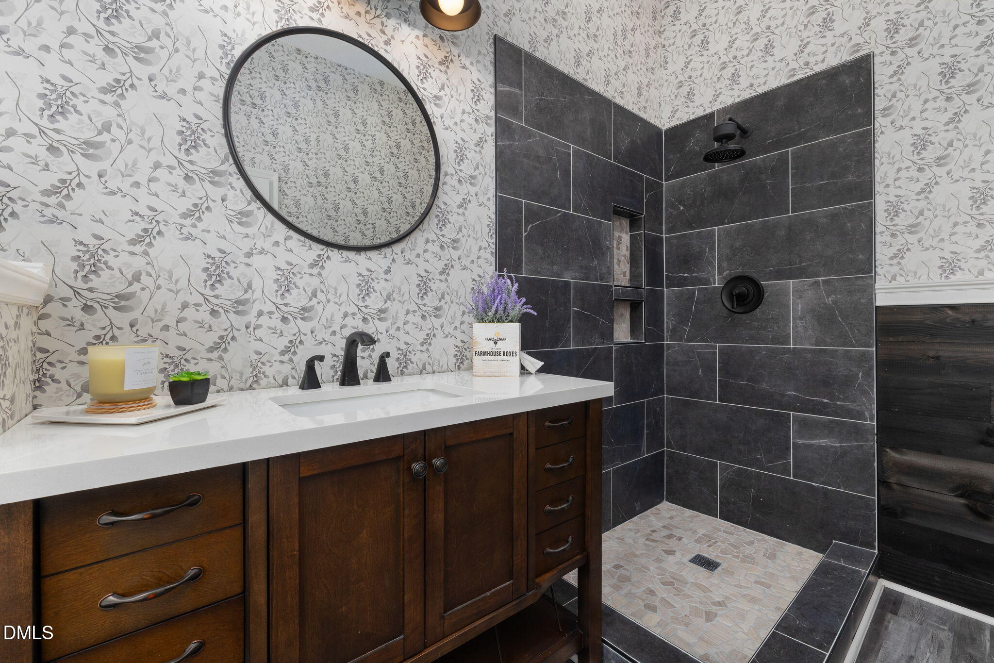 6901 Middleboro Drive Raleigh, NC 27612 - Photo 27 of 42 a bathroom with a sink toilet and a mirror