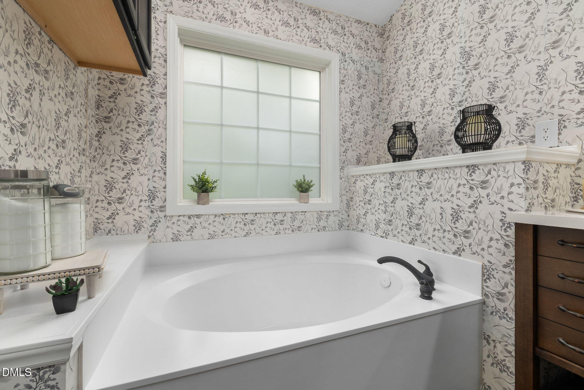 6901 Middleboro Drive Raleigh, NC 27612 - Photo 28 of 42 a bathroom with a bathtub and shower