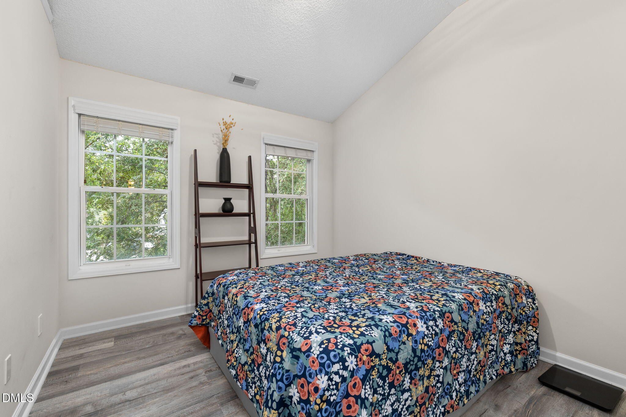 6901 Middleboro Drive Raleigh, NC 27612 - Photo 29 of 42 a bedroom with a bed and a window