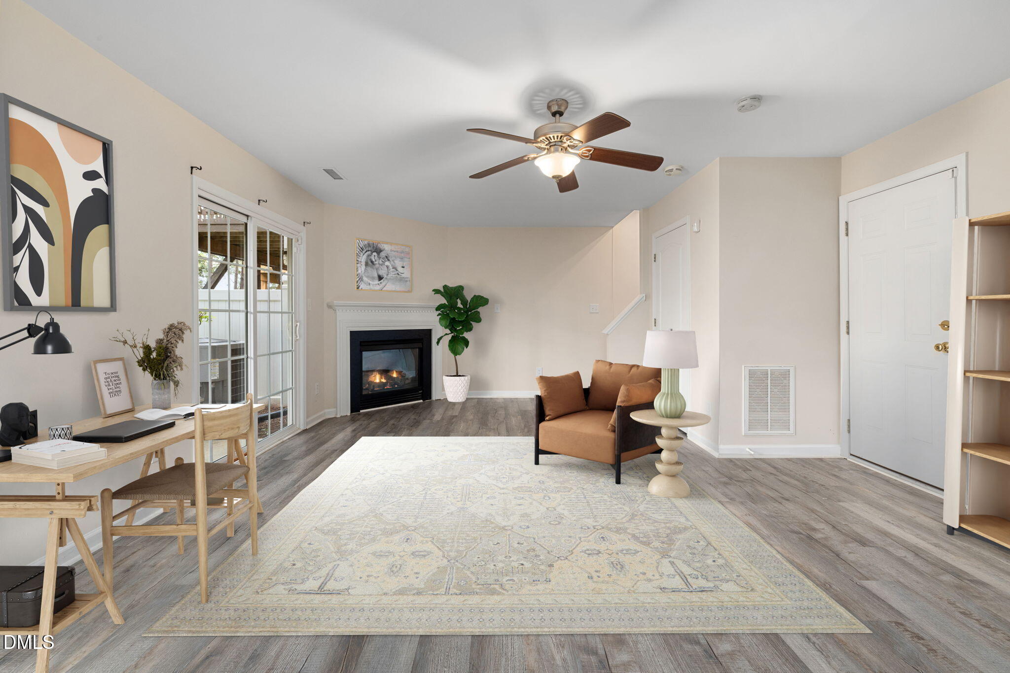 6901 Middleboro Drive Raleigh, NC 27612 - Photo 32 of 42 a living room with furniture and a fireplace