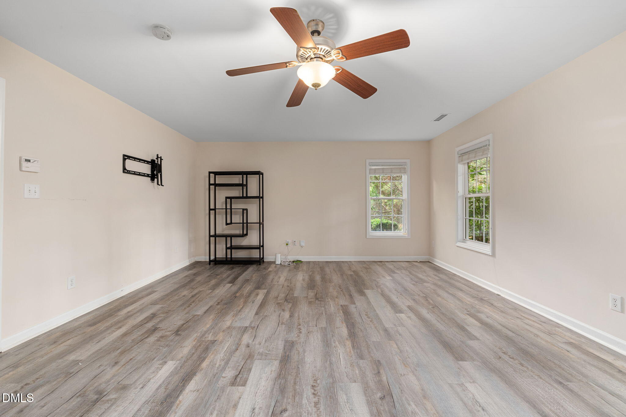 6901 Middleboro Drive Raleigh, NC 27612 - Photo 34 of 42 wooden floor in an empty room with a window