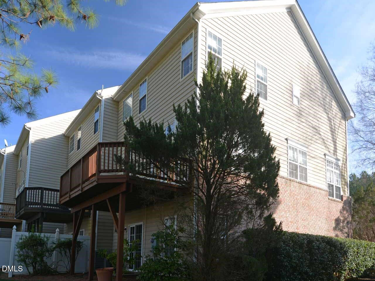 6901 Middleboro Drive Raleigh, NC 27612 - Photo 4 of 42 a view of a house with a tree