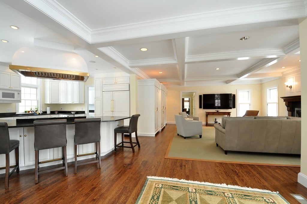 19 Meadowbrook Road Weston, MA 02493 - Photo 12 of 30 a living room with furniture kitchen view and a wooden floor