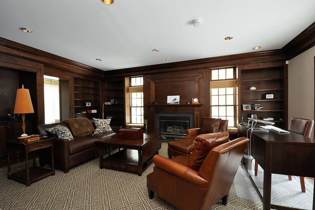 19 Meadowbrook Road Weston, MA 02493 - Photo 3 of 30 a living room with furniture and a fireplace