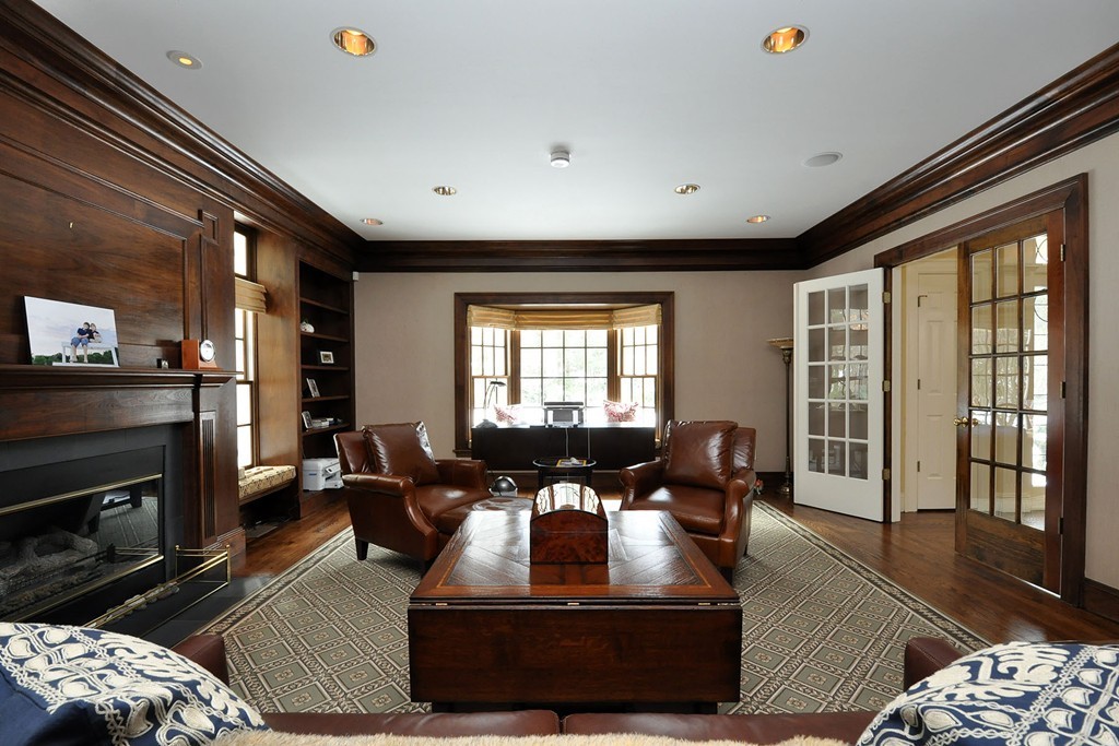 19 Meadowbrook Road Weston, MA 02493 - Photo 4 of 30 a living room with furniture fireplace and flat screen tv