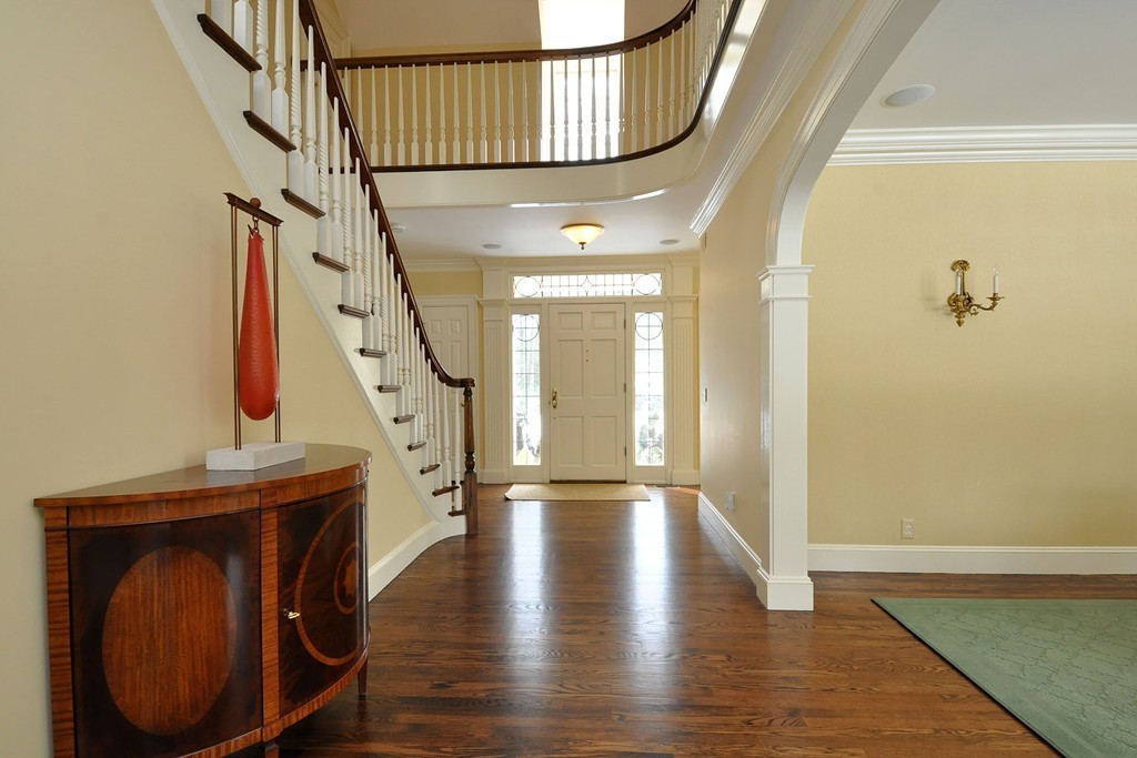 19 Meadowbrook Road Weston, MA 02493 - Photo 6 of 30 a view of an entryway with wooden floor