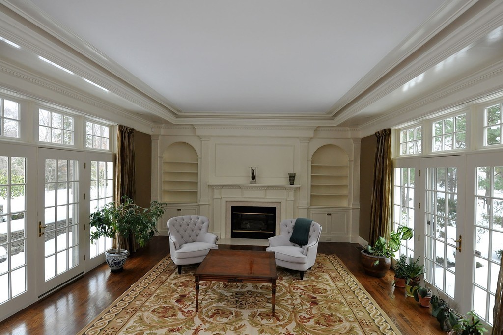19 Meadowbrook Road Weston, MA 02493 - Photo 8 of 30 a living room with furniture fireplace and windows