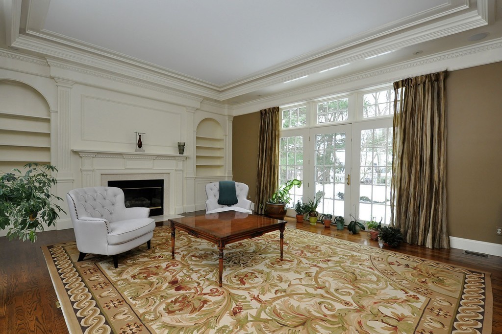 19 Meadowbrook Road Weston, MA 02493 - Photo 9 of 30 a living room with furniture and a fireplace
