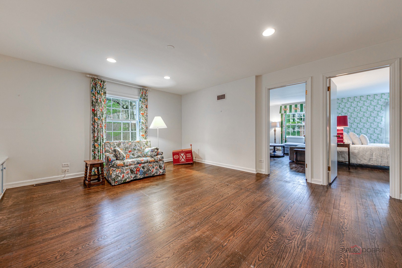 10 North Mayflower Road Lake Forest, IL 60045 - Photo 27 of 38 a living room with furniture and a wooden floor