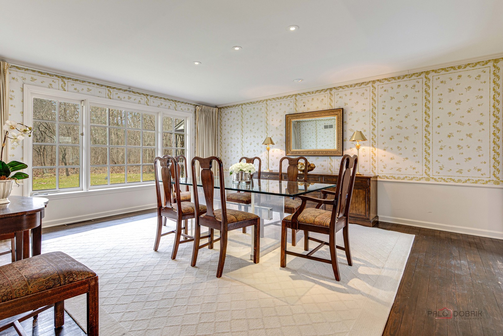 10 North Mayflower Road Lake Forest, IL 60045 - Photo 8 of 38 a view of a dining room with furniture and wooden floor