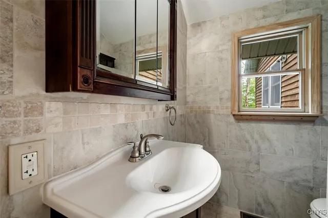 $449,900 | 146 Mohawk Drive West, Webb, NY 13420