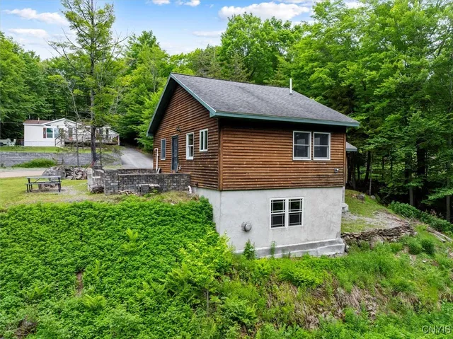 $449,900 | 146 Mohawk Drive West, Webb, NY 13420