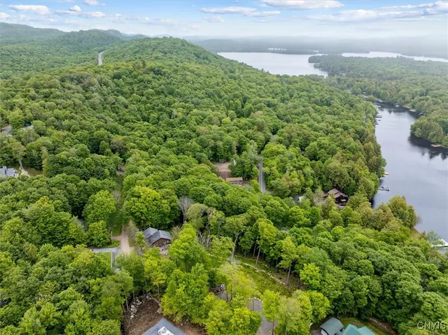 $449,900 | 146 Mohawk Drive West, Webb, NY 13420