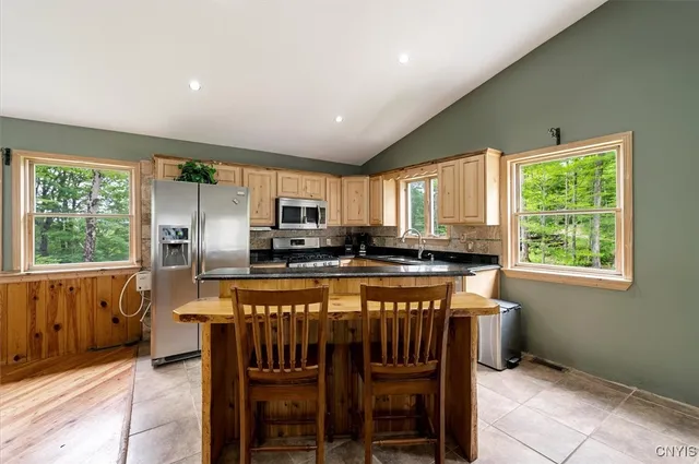 $449,900 | 146 Mohawk Drive West, Webb, NY 13420