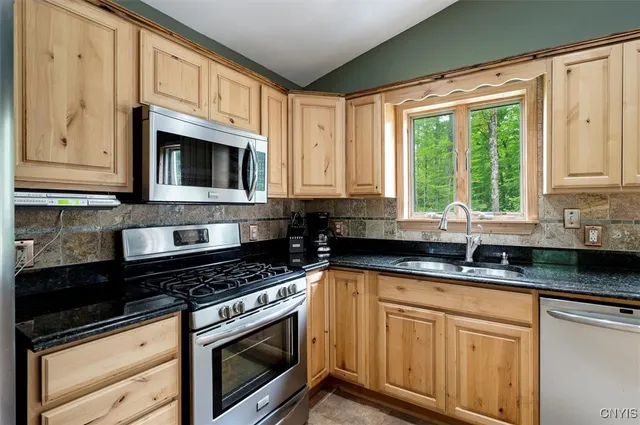 $449,900 | 146 Mohawk Drive West, Webb, NY 13420