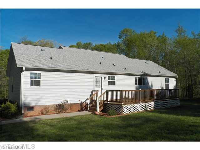 485 Riverview Rd Extension Lexington, NC 27292 - Photo 3 of 16 Exterior Front. Back of home and large deck. Great for enjoying morning sunshine and natural setting.