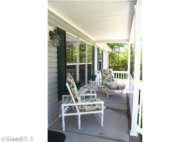 485 Riverview Rd Extension Lexington, NC 27292 - Photo 5 of 16 Other. Covered Front Porch - Enjoy view of the lake and sunsets from this lovely covered porch. Room on both sides of the front door for patio furniture and entertaining.