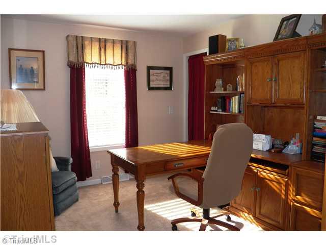 485 Riverview Rd Extension Lexington, NC 27292 - Photo 9 of 16 Den/Family/Great Room. This house is a 3 bedroom house, but septic only approved for 2 bedrooms. Current owner using 3rd bedroom as home office. Room has a small walk in closet and window looking out to front porch and lake.