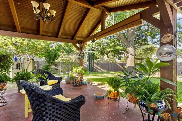 a outdoor dining space with furniture